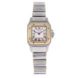 CARTIER - a lady's Santos bracelet watch. Stainless steel case with yellow metal bezel. Reference