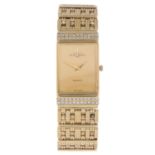 BAUME & MERCIER - a lady's bracelet watch. 18ct yellow gold factory diamond set case. Numbered 50