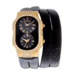PHILIP STEIN - a Teslar wrist watch. Yellow metal factory diamond set case, stamped 18K. Numbered