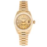 ROLEX - a lady's Oyster Perpetual Datejust bracelet watch. Circa 1982. 18ct yellow gold case with