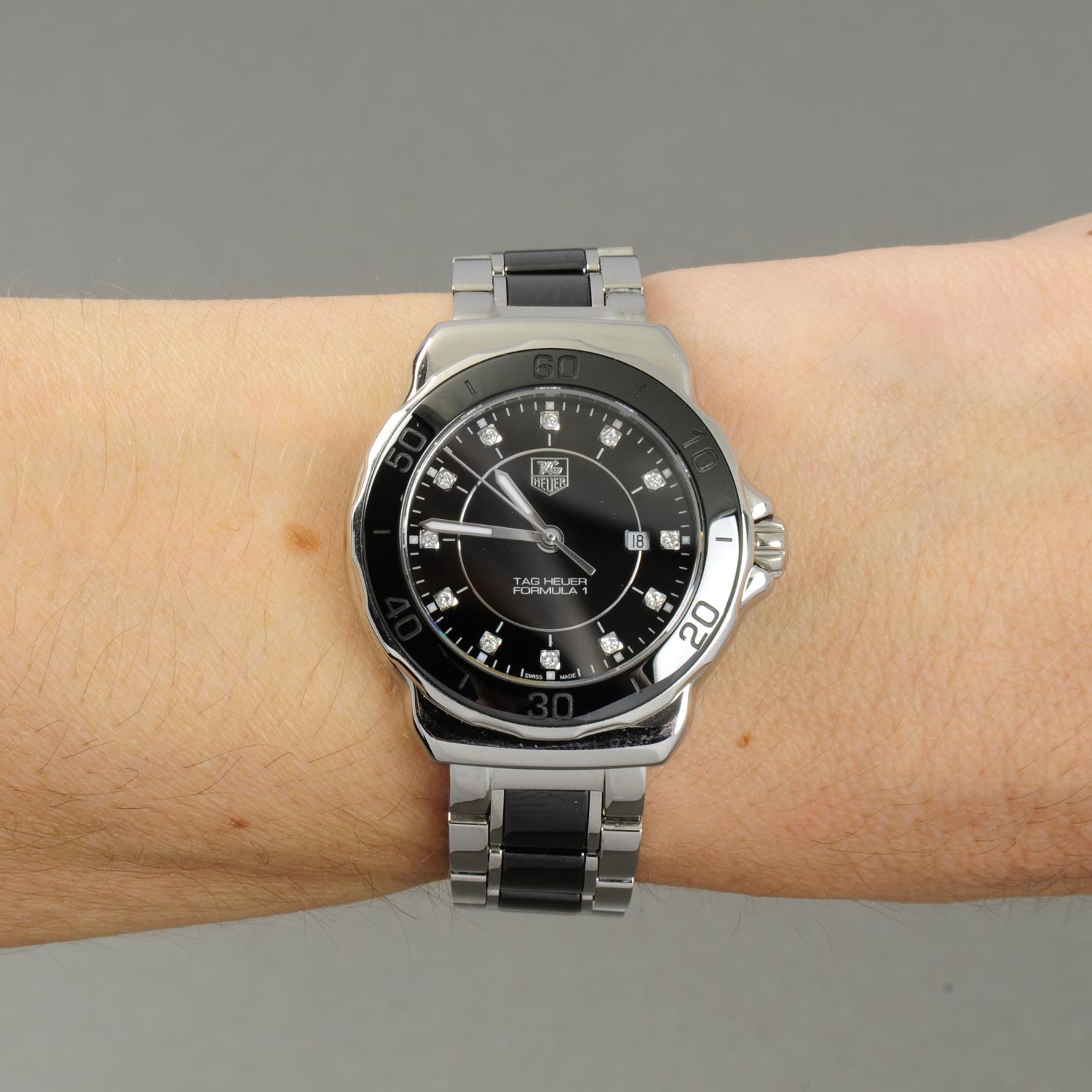 TAG HEUER - a lady's Formula 1 bracelet watch. Stainless steel case with ceramic calibrated bezel. - Image 3 of 7