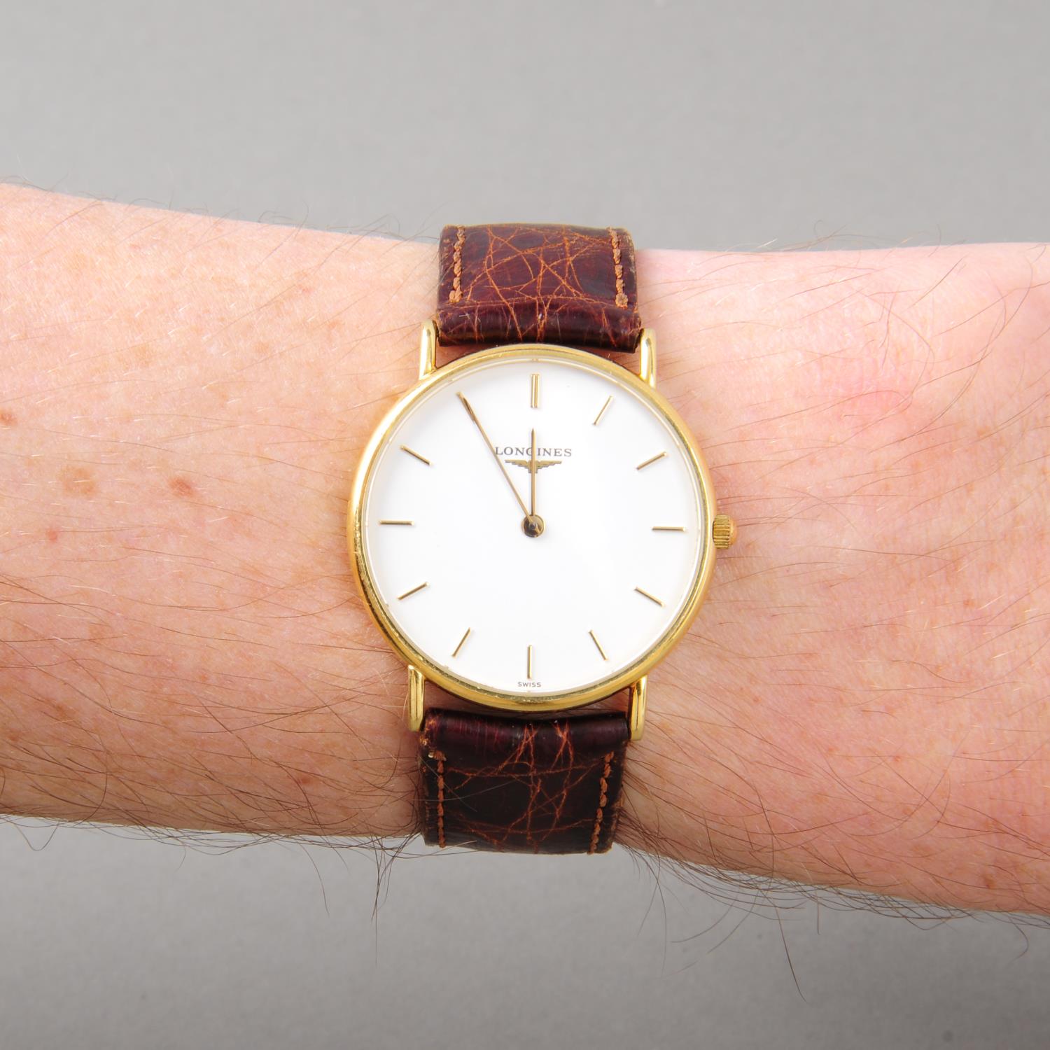 LONGINES - a gentleman's wrist watch. 18ct yellow gold case with engraved case back. Reference L7. - Image 3 of 5