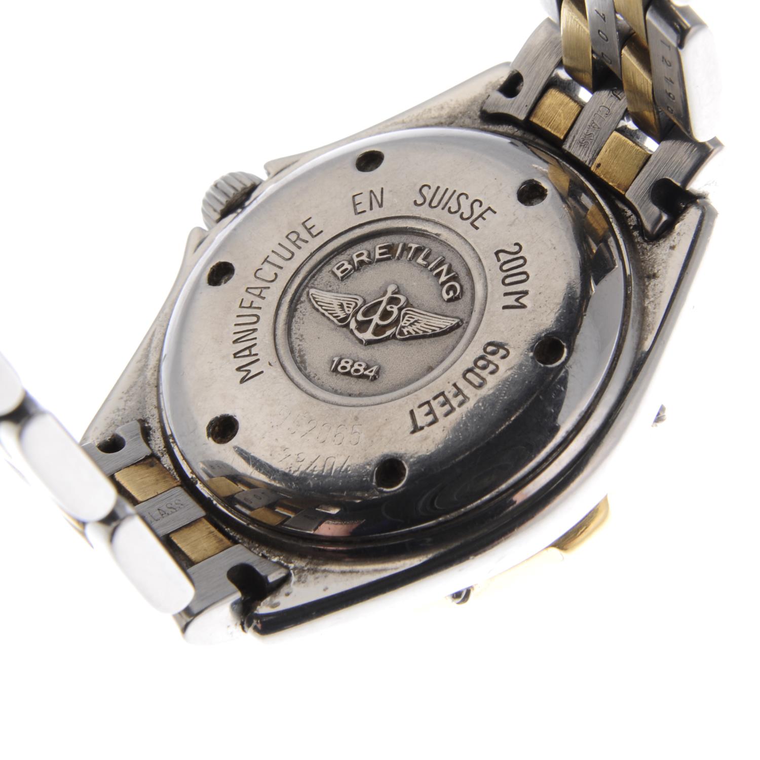 BREITLING - a lady's Lady J bracelet watch. Stainless steel case with yellow metal calibrated bezel. - Image 5 of 5