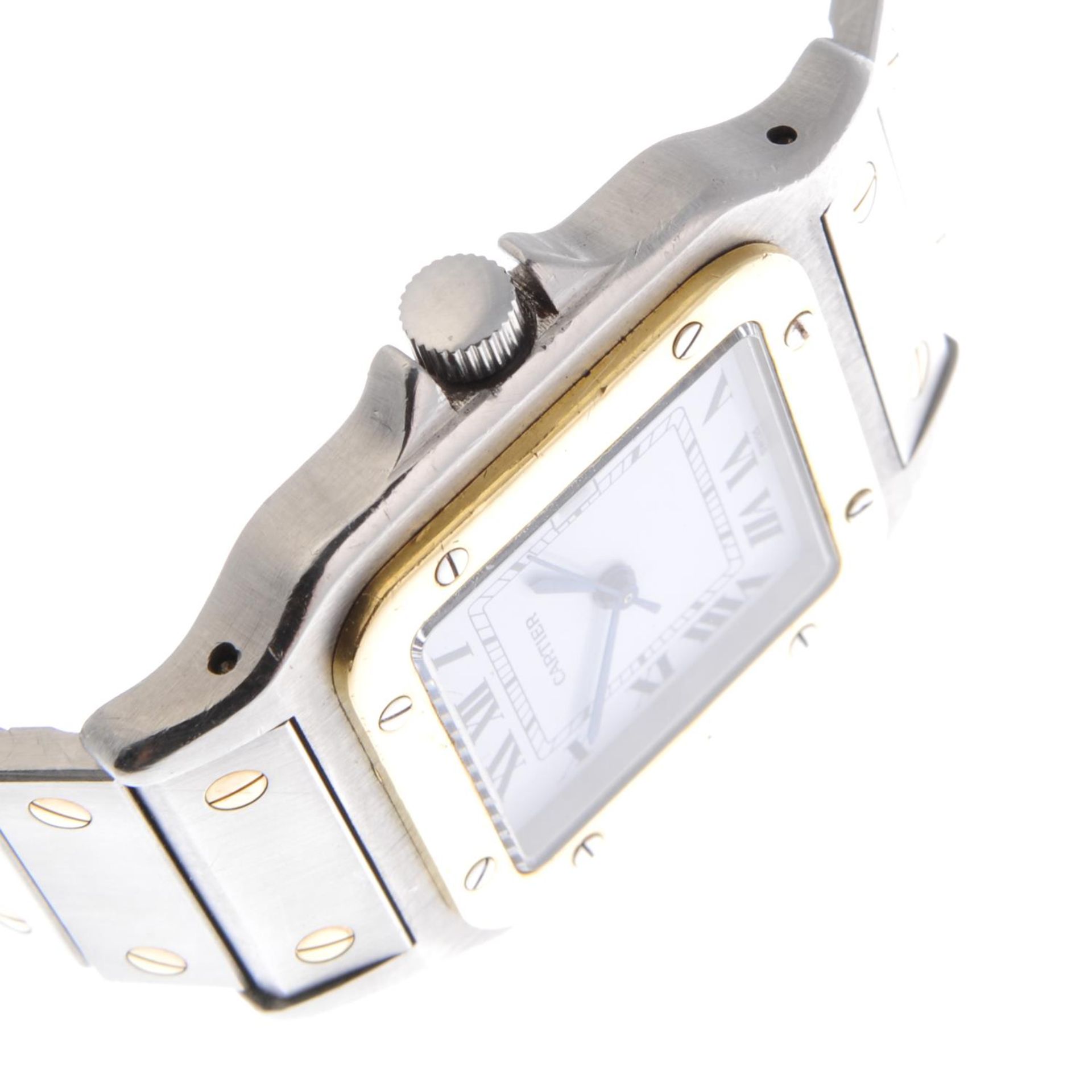 CARTIER - a mid-size Santos bracelet watch. Stainless steel case with yellow metal bezel. Numbered - Image 4 of 5