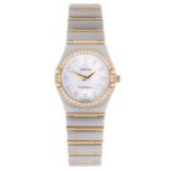 OMEGA - a lady's Constellation bracelet watch. Stainless steel case with yellow metal factory