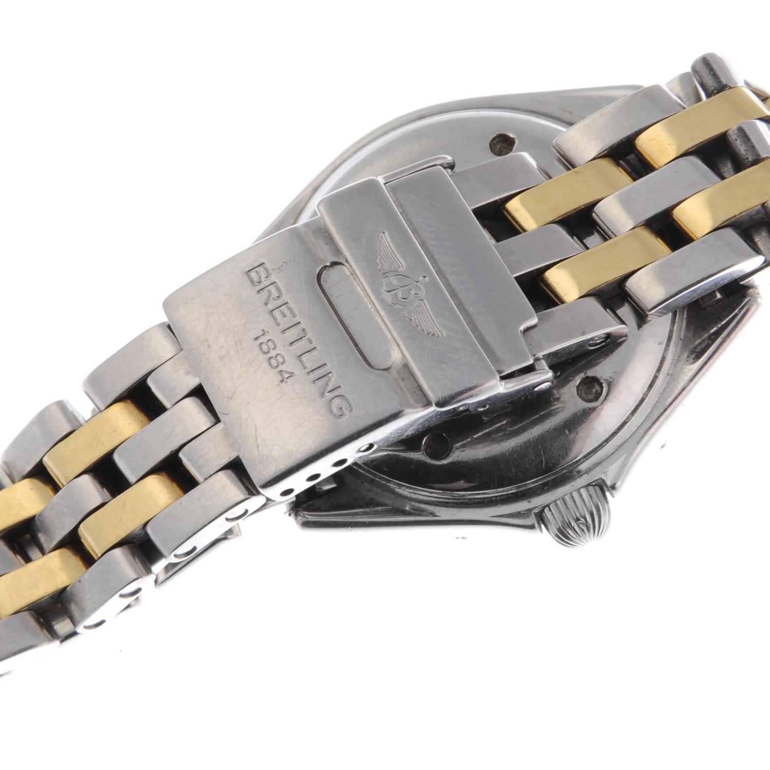 BREITLING - a lady's Lady J bracelet watch. Stainless steel case with yellow metal calibrated bezel. - Image 2 of 5