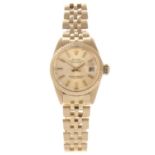 ROLEX - a lady's Oyster Perpetual Datejust bracelet watch. Circa 1978. 18ct yellow gold case with