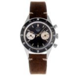 HEUER - a gentleman's Autavia chronograph wrist watch retailed by Gubelin. Stainless steel case with