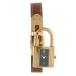 HERMÈS - a lady's Kelly wrist watch. Gold plated case. Reference KE1.201 39.01, serial 823677.