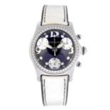 CORUM - a mid-size Bubble chronograph wrist watch. Stainless steel case with factory diamond set