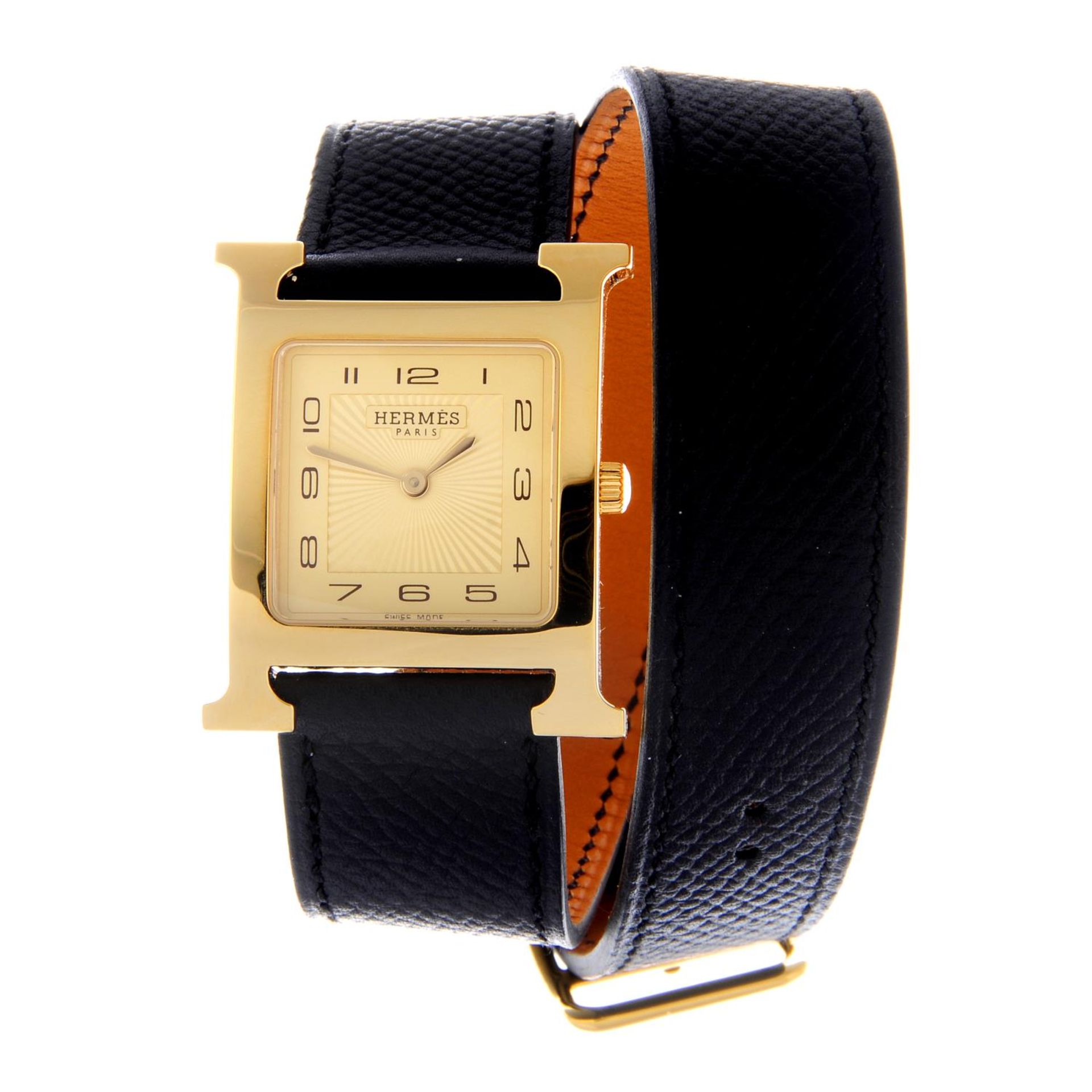 HERMÈS - a gentleman's H wrist watch. Gold plated case with stainless steel case back. Reference