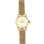 A ladies 9ct gold wrist watch, by Omega.Hallmarks for Birmingham, 1958.Length 16cms.