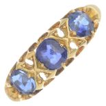 An early 20th century 18ct gold sapphire three-stone ring.Four gemstones deficient.Hallmarks for