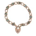 An early 20th century 9ct gold turquoise bracelet, with heart lock clasp.