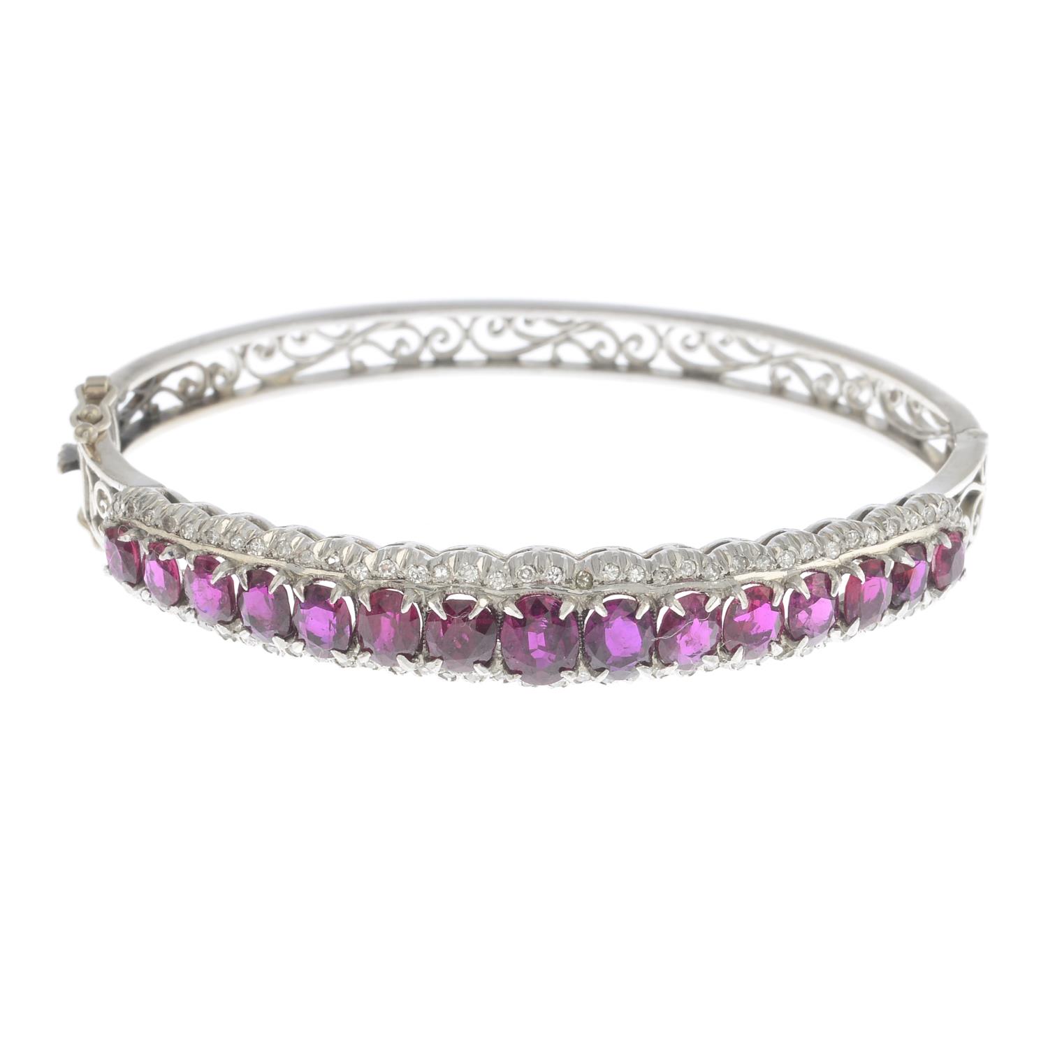 A Thai ruby and diamond hinged-bangle.