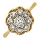 A diamond floral cluster ring.