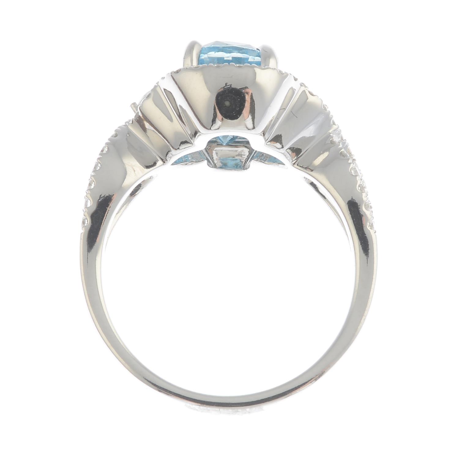 A blue zircon and diamond dress ring.Zircon calculated weight 3.5cts, - Image 3 of 3