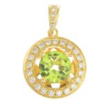 An 18ct gold peridot and diamond pendant.Peridot calculated weight 1.31cts,