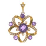 An early 20th century 9ct gold amethyst and split pearl pendant.