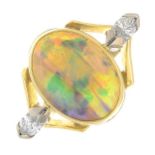An 18ct gold opal and diamond dress ring.Estimated total diamond weight 0.35ct,