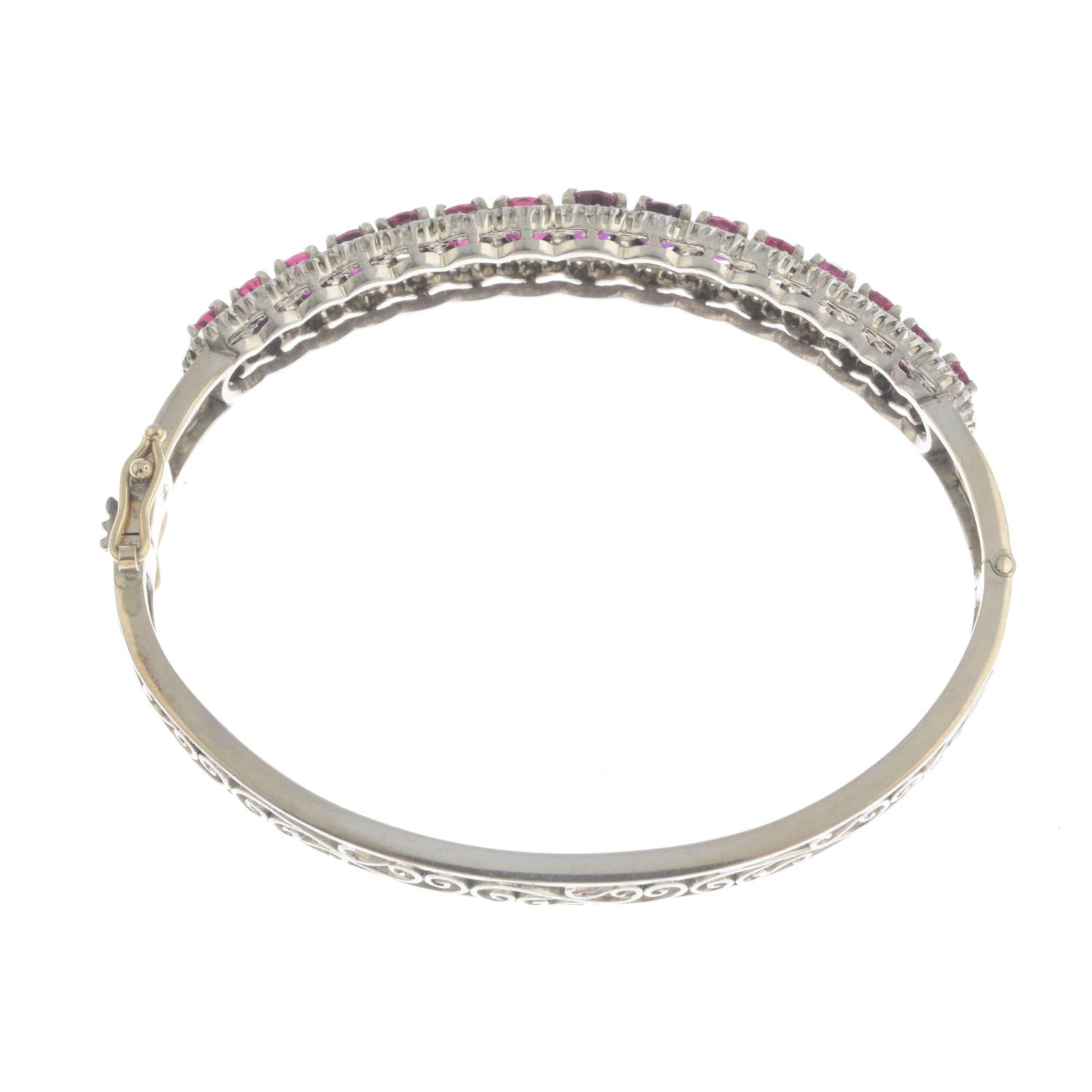 A Thai ruby and diamond hinged-bangle. - Image 2 of 2