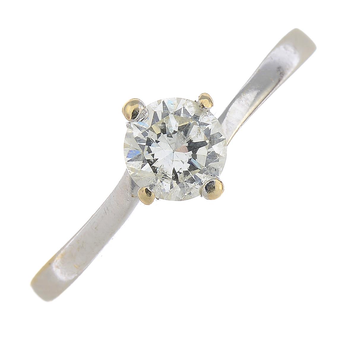 An 18ct gold brilliant-cut diamond single-stone ring.Estimated diamond weight 0.50ct,