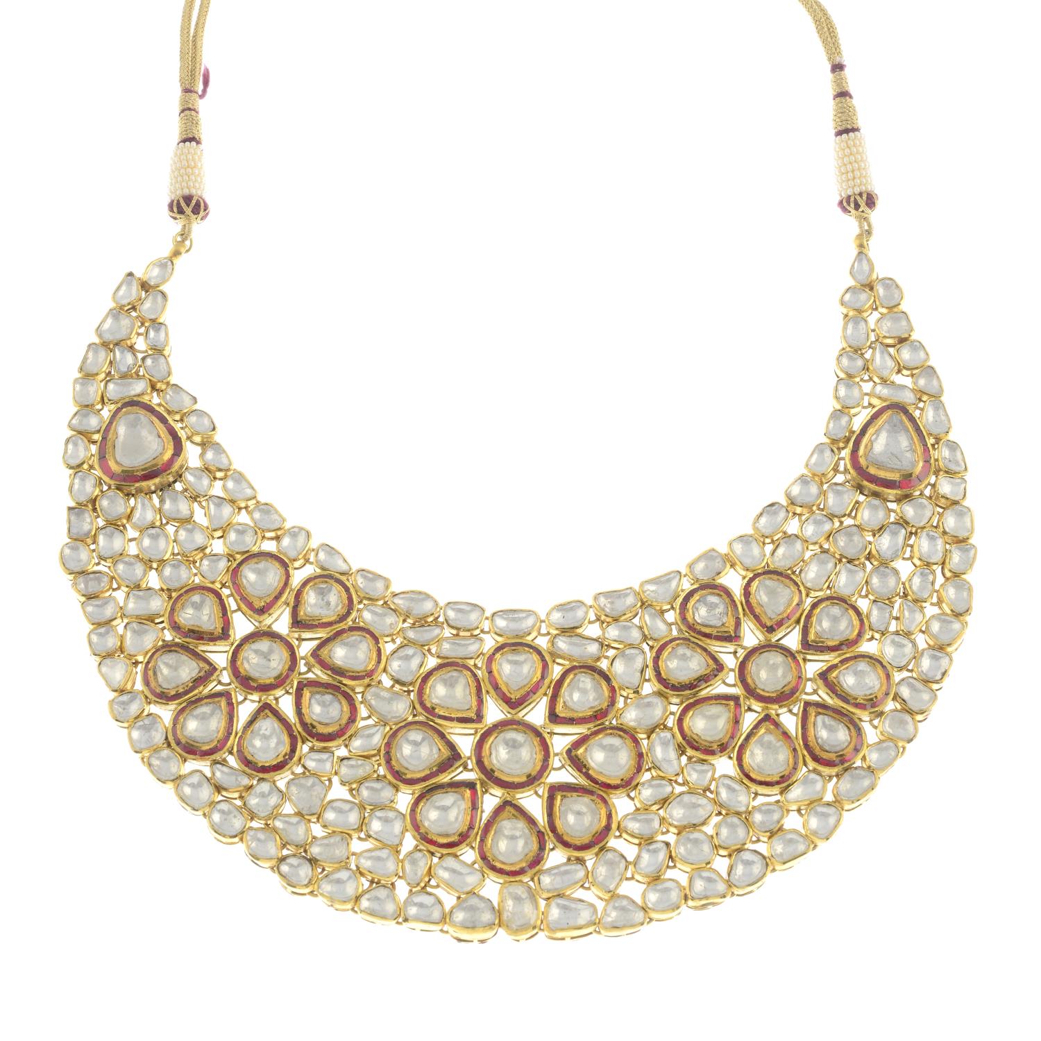 A foil-back diamond and enamel cluster necklace, with woven cord and bead back-chain.