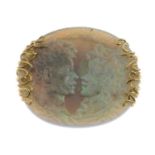 An 18ct gold opal cameo brooch.Hallmarks for Sheffield, 1998.Length 4.7cms.