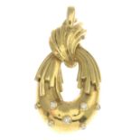 An 18ct gold diamond pendant.Estimated total diamond weight 0.15ct.Hallmarks for London,