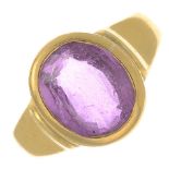 A pink sapphire single-stone ring with half-shank.