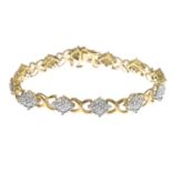 A diamond bracelet.Estimated total diamond weight 1.25cts.Length 17cms.