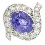 A tanzanite and diamond dress ring.Tanzanite calculated weight 3.46cts,