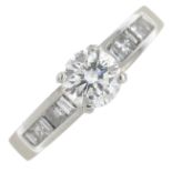 A platinum diamond dress ring.Principal diamond estimated weight 1ct,