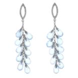 A pair of blue topaz and diamond drop earrings.Estimated total diamond weight 0.30ct.Marked