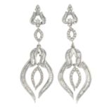 A pair of diamond drop earrings.Estimated total diamond weight 1.25 to 1.50cts.Stamped 750.Length
