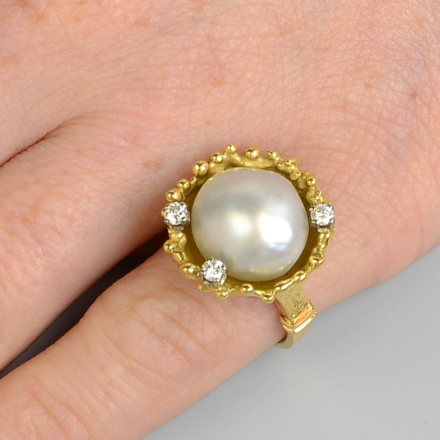 A pair of 1970s 18ct gold baroque cultured pearl and diamond bracelets,