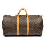 LOUIS VUITTON - a vintage Monogram Keepall 60 luggage bag.