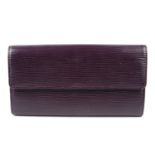 LOUIS VUITTON - a purple Epi Porte Tresor International wallet.