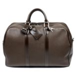 LOUIS VUITTON - a brown Taiga Kendall PM luggage bag.