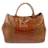 LONGCHAMP - an embossed handbag.