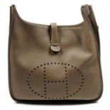 HERMÈS - a 2010 taupe Evelyn TGM handbag.