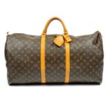 LOUIS VUITTON - a Monogram Keepall 60 luggage bag.