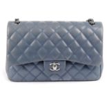 CHANEL - a light blue Jumbo Classic Double Flap handbag.