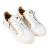GIUSEPPE ZANOTTI - a pair of white low-top trainers.