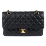 CHANEL - a caviar Medium Classic Double Flap handbag.
