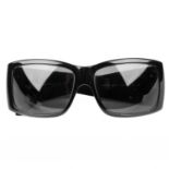 PRADA - a pair of sunglasses.