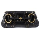 GUCCI - a black Horsebit clutch.