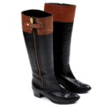 DIANE VON FURSTENBERG - a pair of leather knee-high boots.