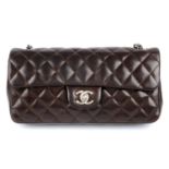 CHANEL - a brown quilted leather baguette handbag.
