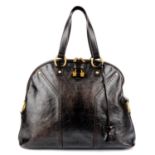 YVES SAINT LAURENT - a dark brown oversized Muse handbag.